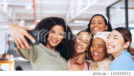 Business women, smile or selfie in office for a fun memory, profile picture or social media post. Happy, teamwork or photograph of friends or coworkers taking pictures on break to relax in workplace Business women, smile or selfie in office for a fun memory, profile picture or social media post. Happy, teamwork or photograph of friends or coworkers taking pictures on break to relax in workplace 132829252