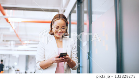 Business, smile and woman with a smartphone, typing and connection with employee, mobile user and search internet. Person, entrepreneur and consultant with a cellphone, website info and social media 132829275