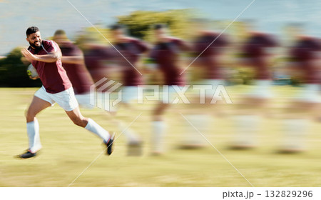 Sports, rugby and running with man on field for training, fitness and speed action in championship. Fast, workout and blur sequence with athlete playing in game for competition, exercise and cardio 132829296
