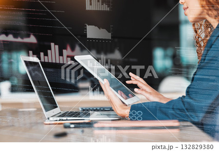 Businesswoman, laptop and tablet in analytics, data planning or marketing strategy at office desk. Hands of female analyst in management on touchscreen or computer for corporate statistics on overlay 132829380