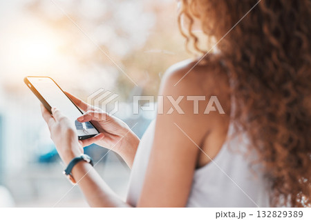 Hands, phone texting and black woman in city, summer sunshine and communication on web, app or chat. Smartphone, social network and girl with blurred background, reading and technology with email ux Hands, phone texting and black woman in city, summer sunshine and communication on web, app or chat. Smartphone, social network and girl with blurred background, reading and technology with email ux 132829389