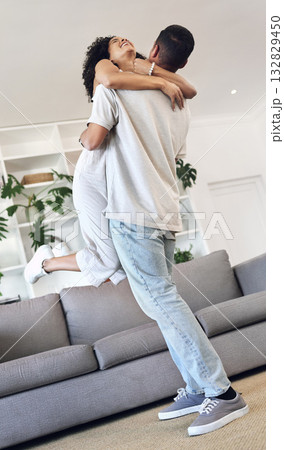 Excited couple, hug and jump with love in new house, real estate and apartment lounge. Happy homeowners hugging to celebrate in living room, property investment and dance with care, fun and happiness Excited couple, hug and jump with love in new house, real estate and apartment lounge. Happy homeowners hugging to celebrate in living room, property investment and dance with care, fun and happiness 132829450