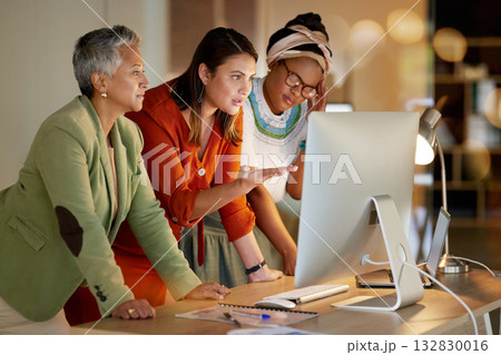 Training, planning and women on a computer for strategy on a project deadline at night. Meeting, advice and business employees reading information on a corporate plan during overtime in a dark office Training, planning and women on a computer for strategy on a project deadline at night. Meeting, advice and business employees reading information on a corporate plan during overtime in a dark office 132830016
