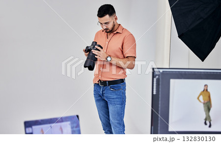 Serious, photographer and man on camera in studio for shoot, magazine project or online content. Backstage or male thinking for digital profession, fashion web design or creative internet catalog Serious, photographer and man on camera in studio for shoot, magazine project or online content. Backstage or male thinking for digital profession, fashion web design or creative internet catalog 132830130
