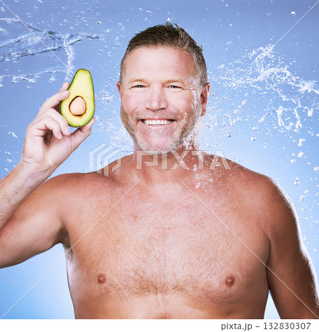 Beauty, water splash with man and avocado for skincare, eco friendly and vegan cosmetics on blue background. Hygiene, hydration and mature male smile in portrait, detox facial and fruit with face Beauty, water splash with man and avocado for skincare, eco friendly and vegan cosmetics on blue background. Hygiene, hydration and mature male smile in portrait, detox facial and fruit with face 132830307