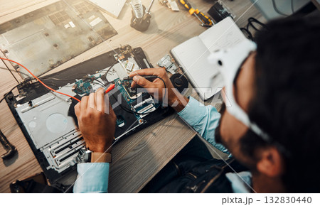 Hardware, engineering and IT professional repair motherboard, microcircuit or electronic device in a workshop or shop. Overhead, man and guy fixing a computer for technology in a lab or factory 132830440