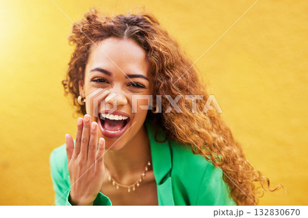 Laughing, funny and portrait of a black woman in the city for freedom, energy and outdoor weekend. Happy, comic and face of a girl with a smile, laugh and pride for fashion on a wall in town 132830670