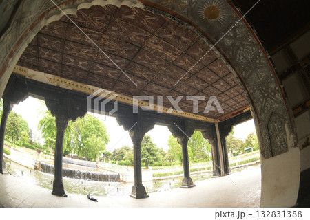 The interior of the Shalimar Bagh Gardens, a beautiful Mughal garden in Srinagar, Jammu and Kashmir, India, is decorated with fountains, ponds and a variety of plants. The interior of the Shalimar Bagh Gardens, a beautiful Mughal garden in Srinagar, Jammu and Kashmir, India, is decorated with fountains, ponds and a variety of plants. 132831388
