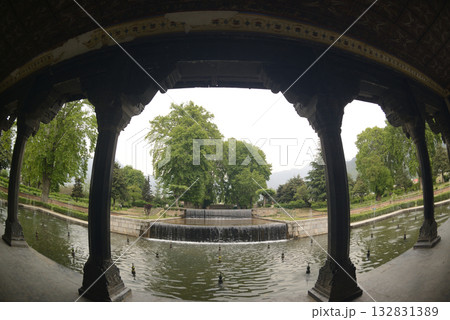The interior of the Shalimar Bagh Gardens, a beautiful Mughal garden in Srinagar, Jammu and Kashmir, India, is decorated with fountains, ponds and a variety of plants. The interior of the Shalimar Bagh Gardens, a beautiful Mughal garden in Srinagar, Jammu and Kashmir, India, is decorated with fountains, ponds and a variety of plants. 132831389