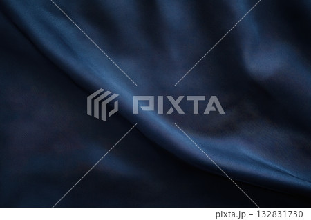 Dark Navy Fabric Texture with Subtle Waves in Studio Shot Background Dark Navy Fabric Texture with Subtle Waves in Studio Shot Background 132831730