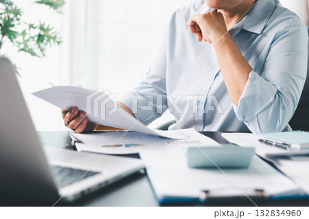 Business person with contract law and paper work for business finance, loan application form, contract real estate and insurance concept. signing contract, working on desk, business document Business person with contract law and paper work for business finance, loan application form, contract real estate and insurance concept. signing contract, working on desk, business document 132834960