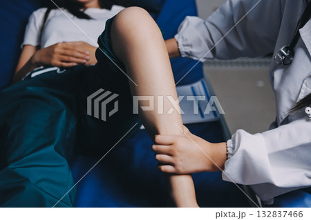 Rehabilitation therapy Professional male physiotherapists working in rehabilitation centers while treating male patients with leg and muscle pain. Rehabilitation therapy Professional male physiotherapists working in rehabilitation centers while treating male patients with leg and muscle pain. 132837466