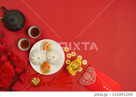 Traditional Chinese New Year Feast with Tea and Dumplings Traditional Chinese New Year Feast with Tea and Dumplings 132841209