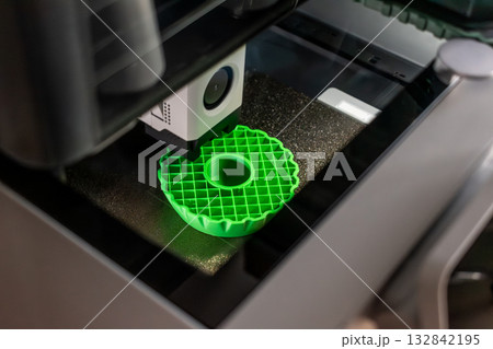 3d printer printing an object on the tray with pla filament, corn starch, non-waterproof filament 132842195