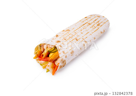 Delicious wrap filled with grilled chicken, fresh vegetables, and sauces Delicious wrap filled with grilled chicken, fresh vegetables, and sauces 132842378