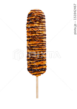 Chocolate drizzled corn dog and crispy coating 132842467