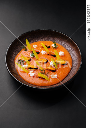 Delicious seafood dish served in a creative presentation with fresh ingredients 132842573