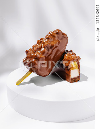Delicious chocolate ice cream bars with creamy filling on a white plate Delicious chocolate ice cream bars with creamy filling on a white plate 132842641