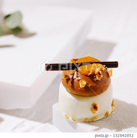 Delicious dessert with chocolate mousse and caramel topping at a stylish cafe 132842852