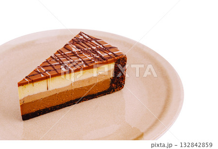 Delicious layered chocolate dessert on a plate ready to be enjoyed Delicious layered chocolate dessert on a plate ready to be enjoyed 132842859