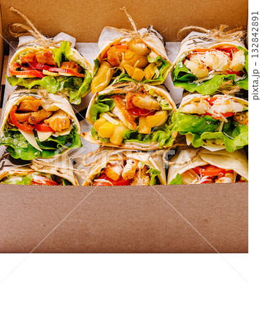 Freshly prepared wraps arranged in a box for a delicious meal experience 132842891