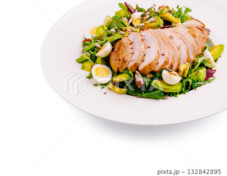 Grilled chicken salad with fresh vegetables and hard-boiled eggs on plate Grilled chicken salad with fresh vegetables and hard-boiled eggs on plate 132842895
