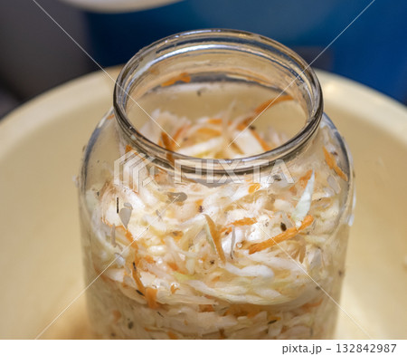 Glass jar with home made sauerkraut Glass jar with home made sauerkraut 132842987