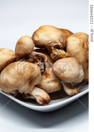 Lot of japanese mushrooms on a white background 132844082