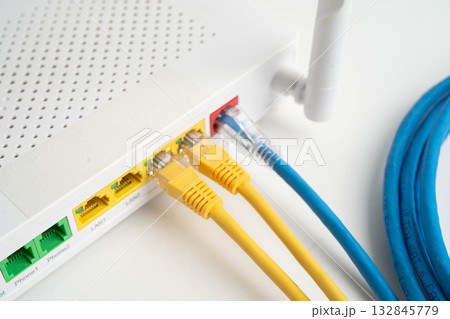 Ethernet cable with wireless router connect to internet service provider network. 132845779