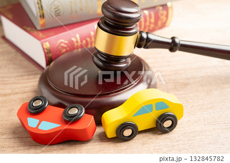 Car accident lawsuit and insurance, Judge hammer with car model. Car accident lawsuit and insurance, Judge hammer with car model. 132845782