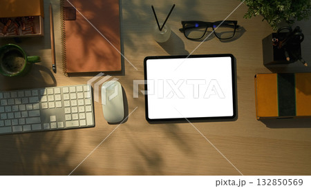 Office desk tablet with computer keyboard, notebook and office supplies 132850569