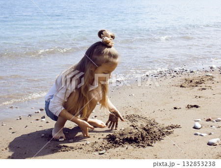 little cute girl on beach, lifestyle people concept little cute girl on beach, lifestyle people concept 132853238