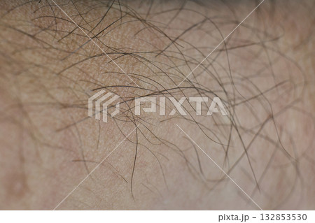 Detailed look at fine hair on human skin surface 132853530