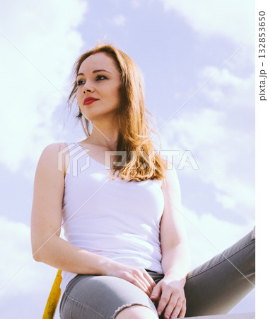 Girl casual clothing relaxing outdoor Girl casual clothing relaxing outdoor 132853650