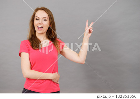 Woman making victory sign Woman making victory sign 132853656