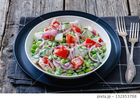 creamy tomato cucumber edamame bean onion salad creamy tomato cucumber edamame bean onion salad 132853708