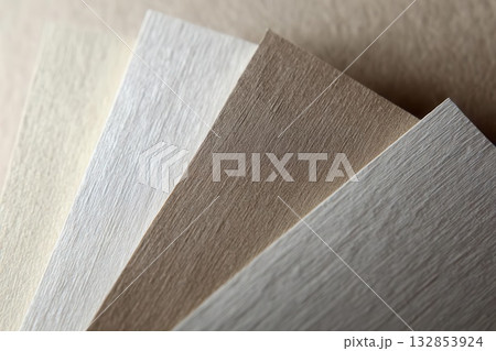 Elegant Textured Paper Swatches Fan, Neutral Tones, Macro Shot 132853924