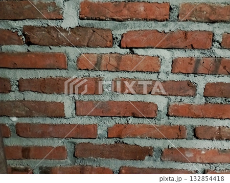 Rough Red Brick Wall Texture with Wide Gray Mortar Joints Rough Red Brick Wall Texture with Wide Gray Mortar Joints 132854418