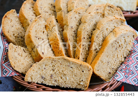 Whole Grain Healthy Sandwich Bread Square Slices, Supermarket Bread for Toasts, Soft Sandwich Loaf Pieces on wooden Background Top View, Clipping Path. wheat bread Whole Grain Healthy Sandwich Bread Square Slices, Supermarket Bread for Toasts, Soft Sandwich Loaf Pieces on wooden Background Top View, Clipping Path. wheat bread 132855443