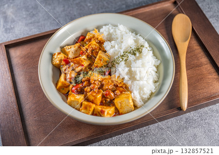 Mapo Tofu Rice Bowl (Mapo Doufu Fan), a popular and spicy Chinese dish from Sichuan province. Mapo Tofu Rice Bowl (Mapo Doufu Fan), a popular and spicy Chinese dish from Sichuan province. 132857521