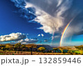 Rainbow Over Scenic Landscape with Dramatic Clouds 132859446