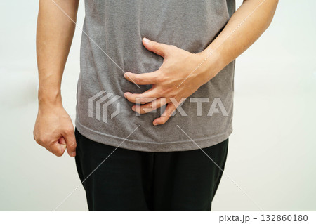 Hernia, Asian man stomach ache, abdominal pain and urology problem health. 132860180