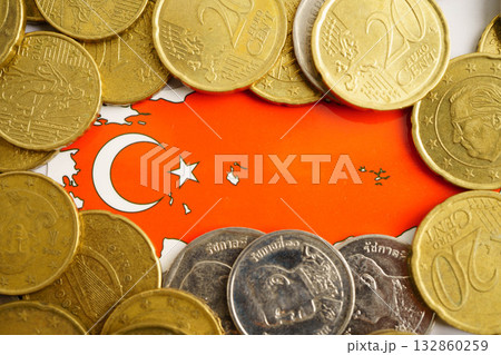 Turkey flag on coins background, finance and accounting, banking concept. Turkey flag on coins background, finance and accounting, banking concept. 132860259