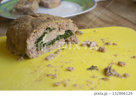 piece of the spinach meatloaf cut half piece of the spinach meatloaf cut half 132866126