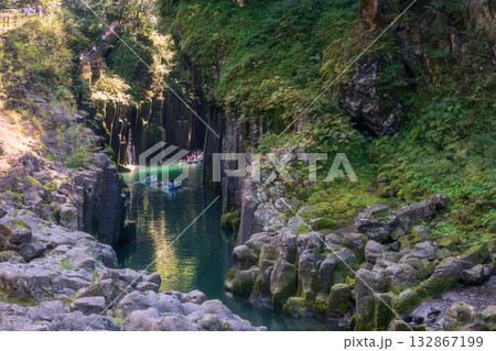 Tourist people sailing rowboat over blue water of Takachiho gorge, Miyazaki 132867199