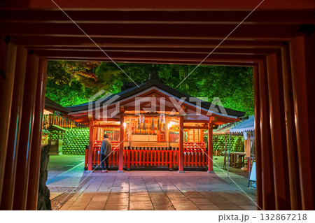people at Fushimi inara shrine view from Torii gate at night, Kyoto 132867218