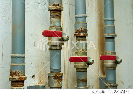 Plumbing contrlol.Water valve shutting off the water tap in basement 132867373