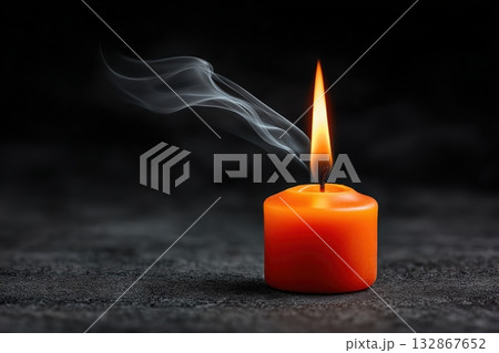 Flame dances as shadowy smoke curls gracefully from vibrant candle 132867652