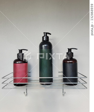 Bottles with Dispensers on Wire Shelf Bottles with Dispensers on Wire Shelf 132868939