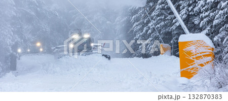 Snow groomer ratrack machine, ski slope, banner 132870383